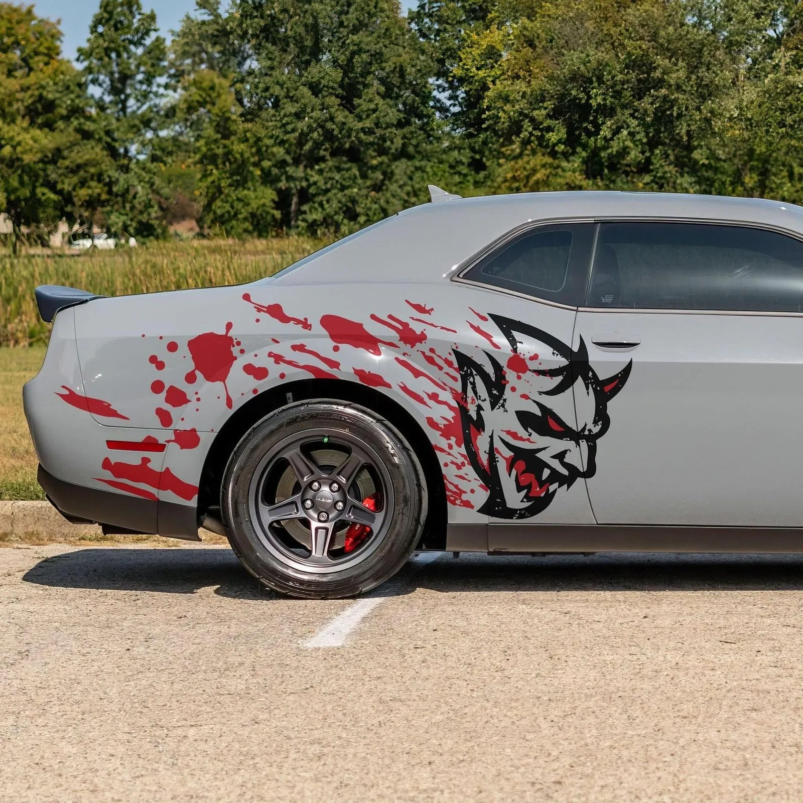 Demon side graphic on a Dodge Challenger
