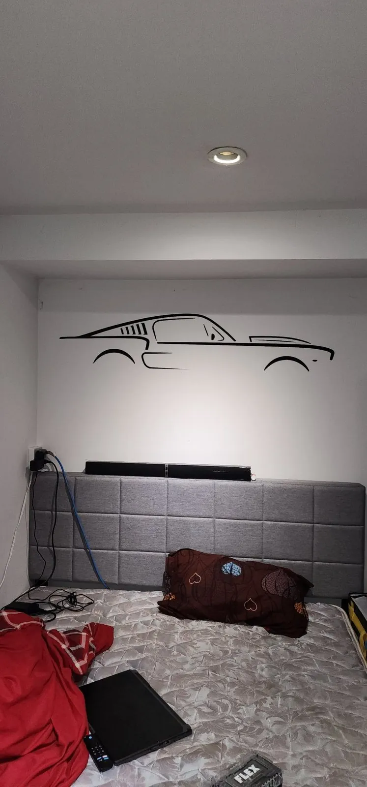 Car silhouette wall decal installed in a living room